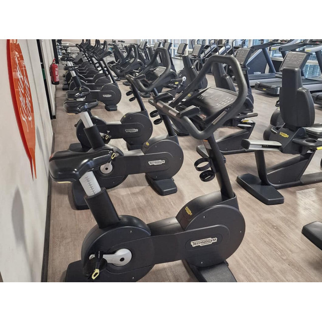 TECHNOGYM Excite 1000 LED rower pionowy Używana/Regenerowana - Idealny stan